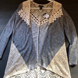 Never worn Rue21 lace cardigan. Size XS.